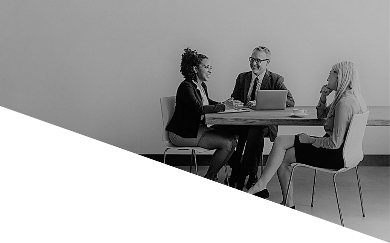 people sitting around a meeting table